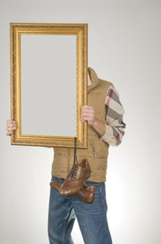 Man holding empty frame