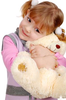 Beauty little girl with teddy-bear studio shot