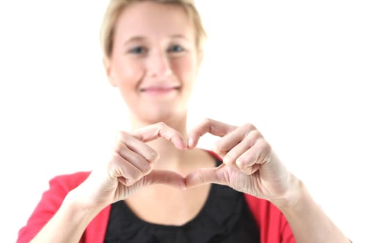 woman making a finger heart sign