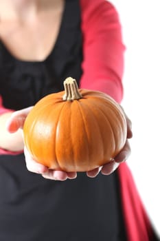 girl holding a pretty pumpkin