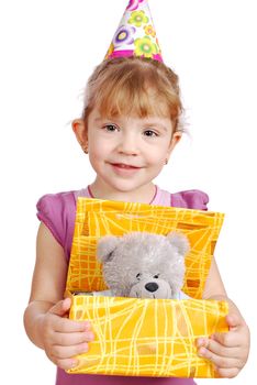 Little girl with teddy-bear birthday gift