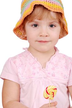 Little girl with lollipop studio shot