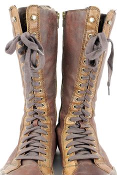 Tall leather boots with cross shoelace