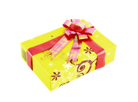 yellow gift box with red ribbon isolated on white background