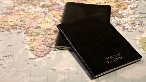 Blank passport with the world map in the background
