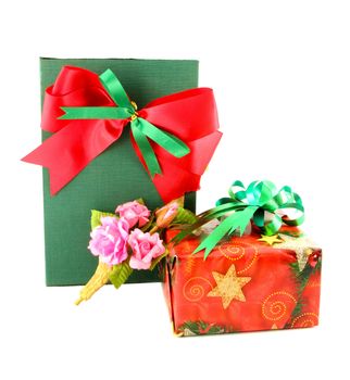 red and green gift box with ribbon on white background