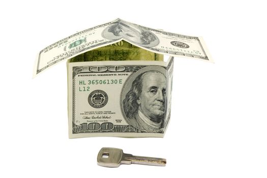 House of dollars and key isolated on white background