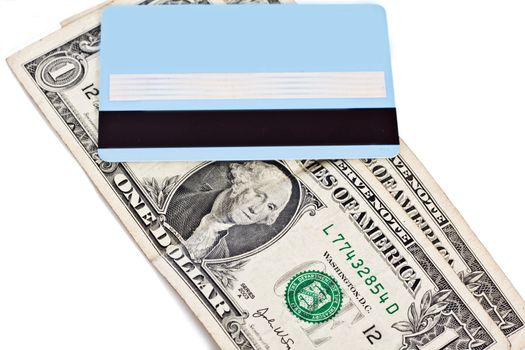 Bank credit card and dollars isolated on a white background