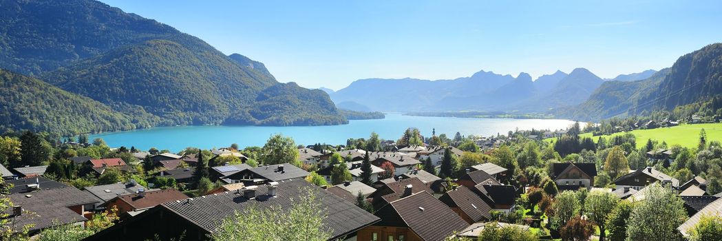 Village near the lake in the Alps mountains. Austria