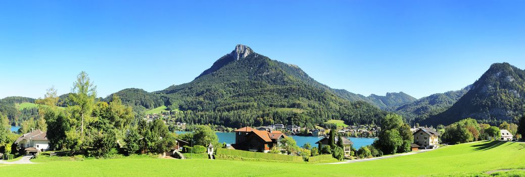 Village near the lake in the Alps mountains. Austria