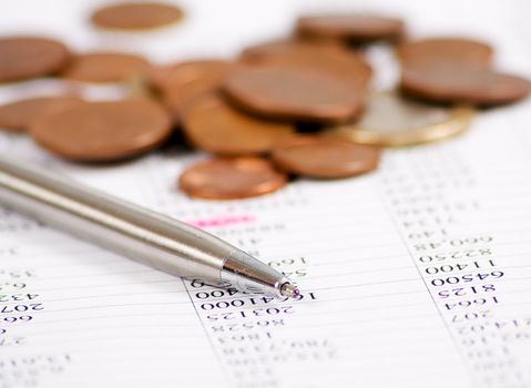 pen and money coins macro