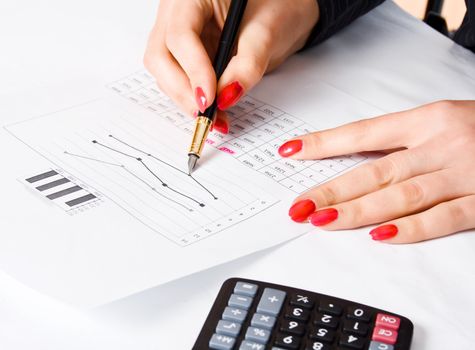 Girl examines charts and business development