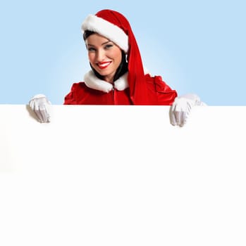 Portrait of a santa girl with a blank banner