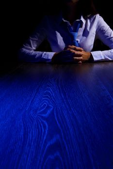 Business woman at office sitting at table