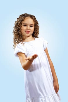 Portrait of an adorable preschool age girl wearing a Christmas holiday outfit