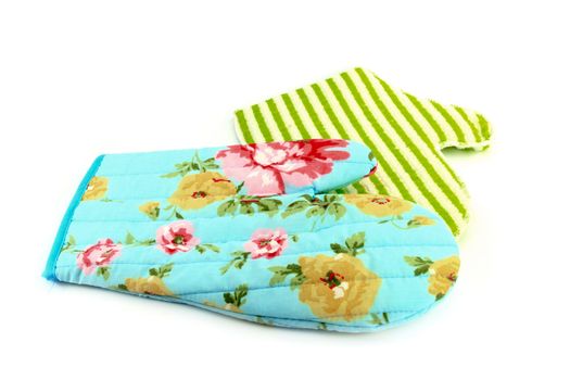 two oven gloves in cyan and green