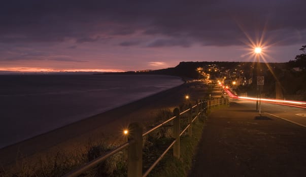 Looking at the beach in Budmouth at sutset 