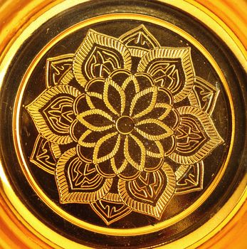 lotus pattern on gold tray of buddha