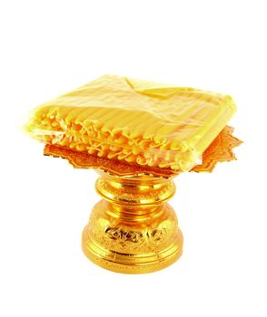 candle pack on golden tray on white background