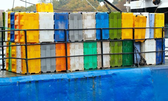 Bright colorful containers on the cargo ship at the port.