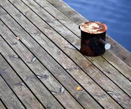 Mooring rope in the port. Autumn. Wide shot.