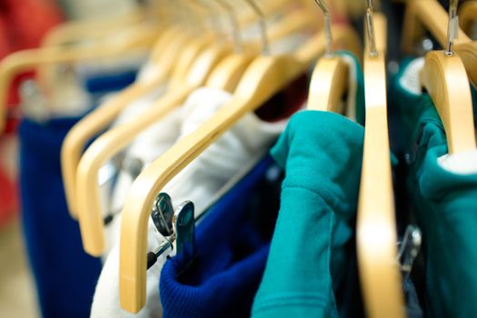 Hangers in the clothes store. Shallow dof.