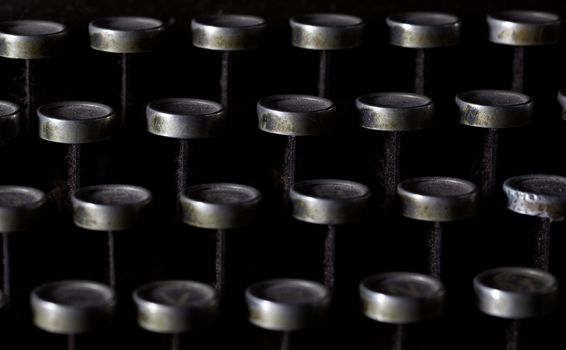 Keyboard of a vintage typewriter in close up, frontal view