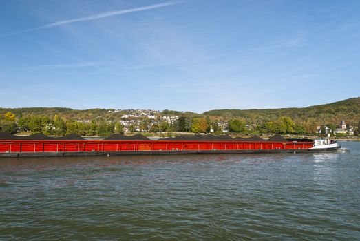 Cargo ship transporting coal. River Rhein, Germany
