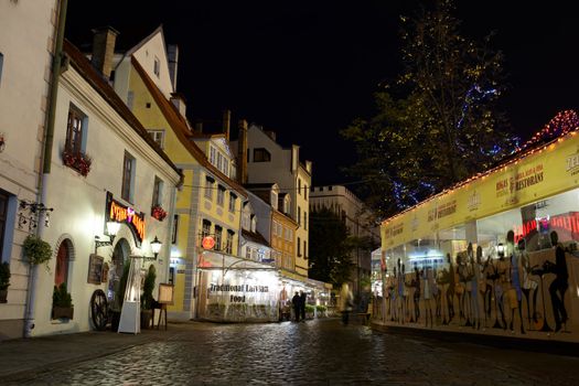 RIGA, LATVIA - OCTOBER 11:  Street bars and restaurants in the evening in the old city of Riga, October 11, 2012 in Riga, Latvia.