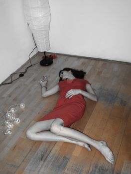 Woman in red Lying on the ground