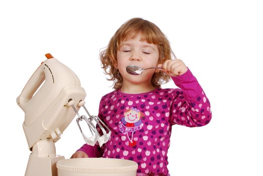 Little girl enjoy in sweet cream studio shot