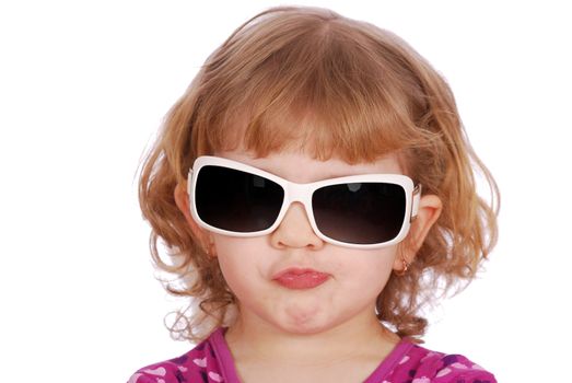Little girl with big sunglasses studio shot