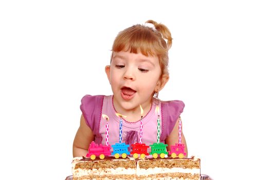 Little girl with birthday candles and cake studio shot