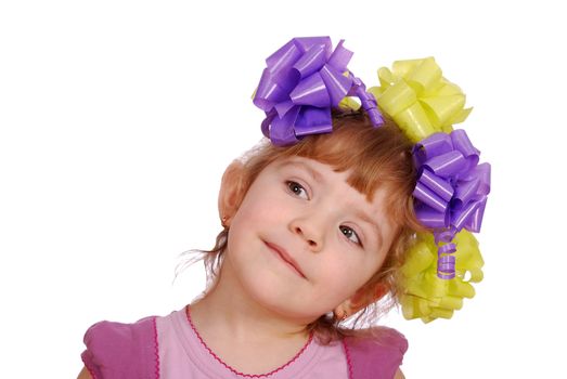 Beauty little girl with colorful ribbons in hair