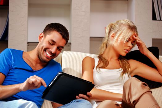 bright picture of couple with tablet PC