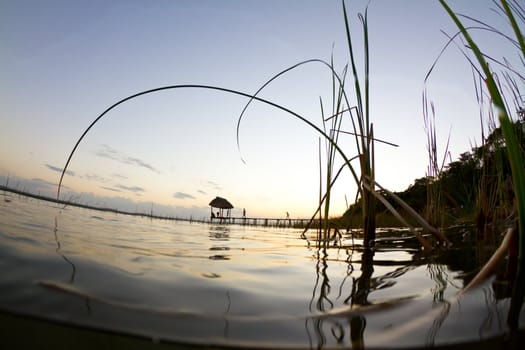 The sun goes down over lake peten in Guatemala