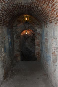 Well lit catacombs of the castle in Dubno, Ukraine