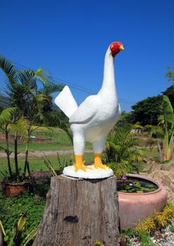 Large white stone chicken statue