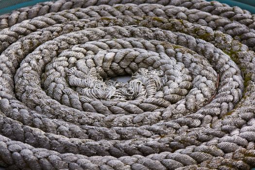 Coiled mooring rope on a ship's deck