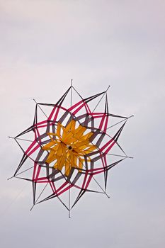 Twenty-sided balsa wood kite riding the wind