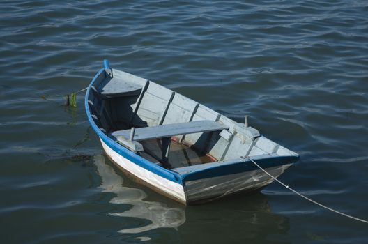 blue boat at sea