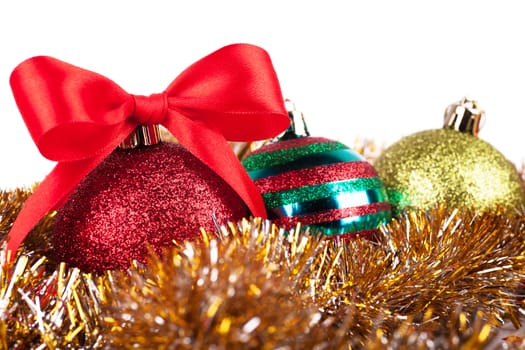 Christmas decorations and tinsel over white background