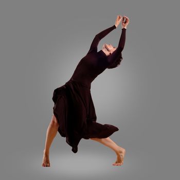 dancer on a gray background , motion