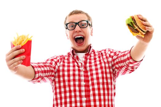 Funny man in glasses with crisp french fries and hamburger