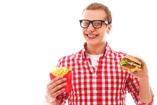 Funny man in glasses with crisp french fries and hamburger