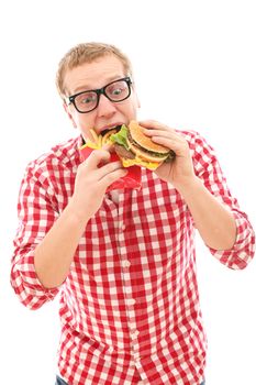 Funny man in glasses with crisp french fries and hamburger