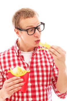 Funny man in glasses with crisp french fries and hamburger