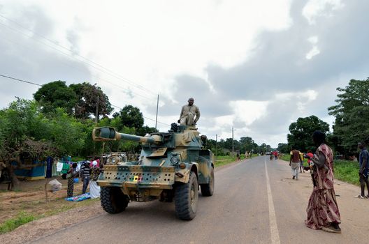 Kartiak,Senegal-September 18,2012 : military tank patrols in the streets in the ritual of Boukoutt of Initiation ceremony on September 18, 2012 in Kartiak, Senegal. The ceremony occurs every 30 years and celebrates boys becoming men.
