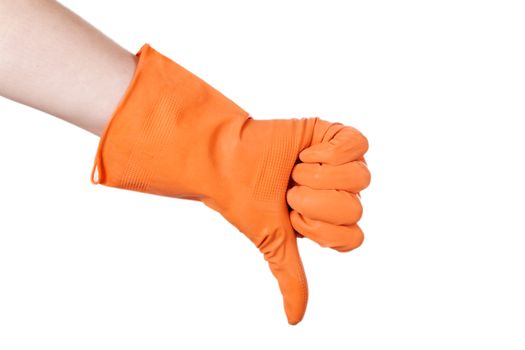 Thumb down in the orange vinyl gloves isolated on white background
