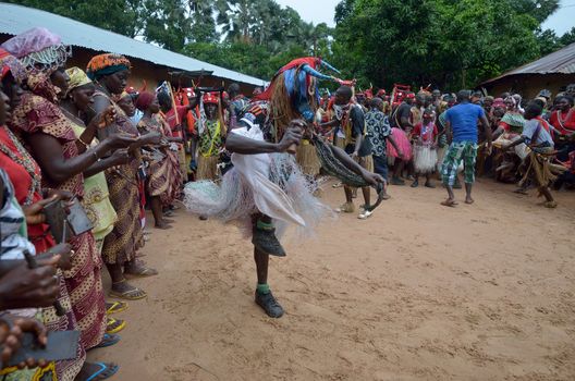 Kartiak,Senegal-September 18,2012 :people dance in the ritual of Boukoutt of Initiation ceremony on September 18, 2012 in Kartiak, Senegal. The ceremony occurs every 30 years and celebrates boys becoming men.